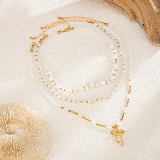 LAIS Beaded Bow Pendant Necklace – Elegant Gold Layered Necklace for Women